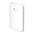 TP-Link AX1800 wall plate Wi-Fi 6 access point in matte white against a plain white background.