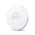 TP-Link EAP670 circular white ceiling mount Wi-Fi 6 access point on a plain white background